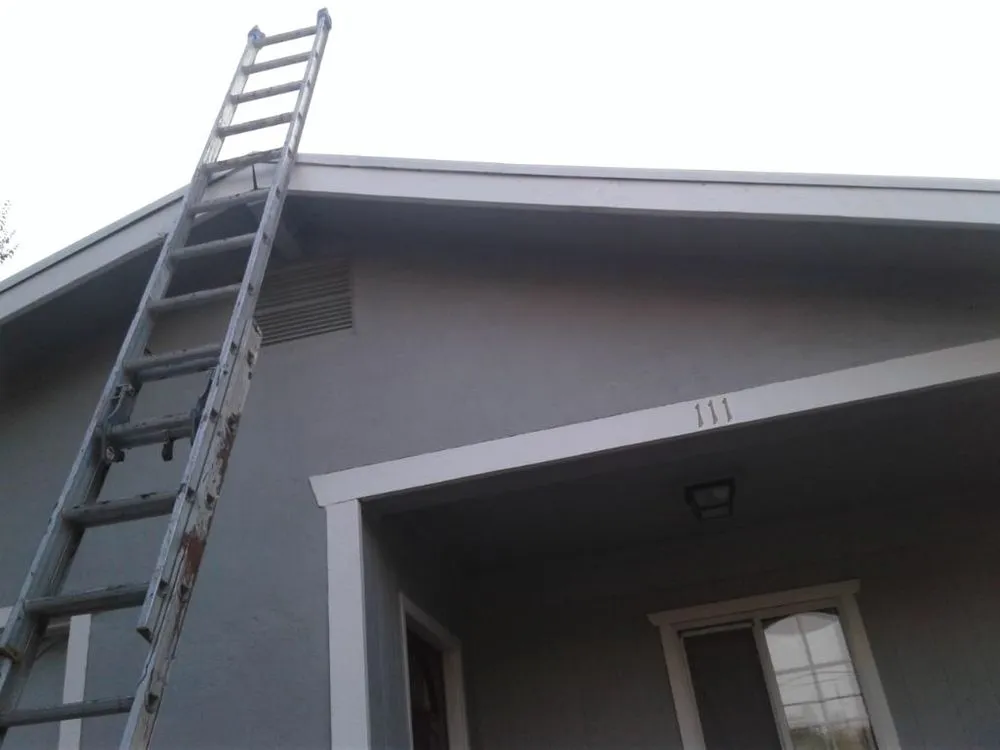 Slide of Francos Roofing