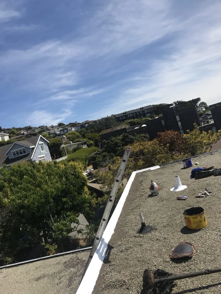 Slide of Francos Roofing