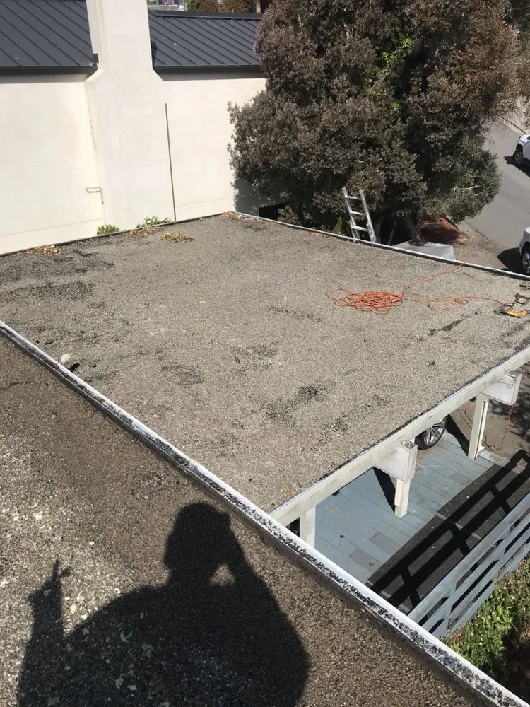 Slide of Francos Roofing