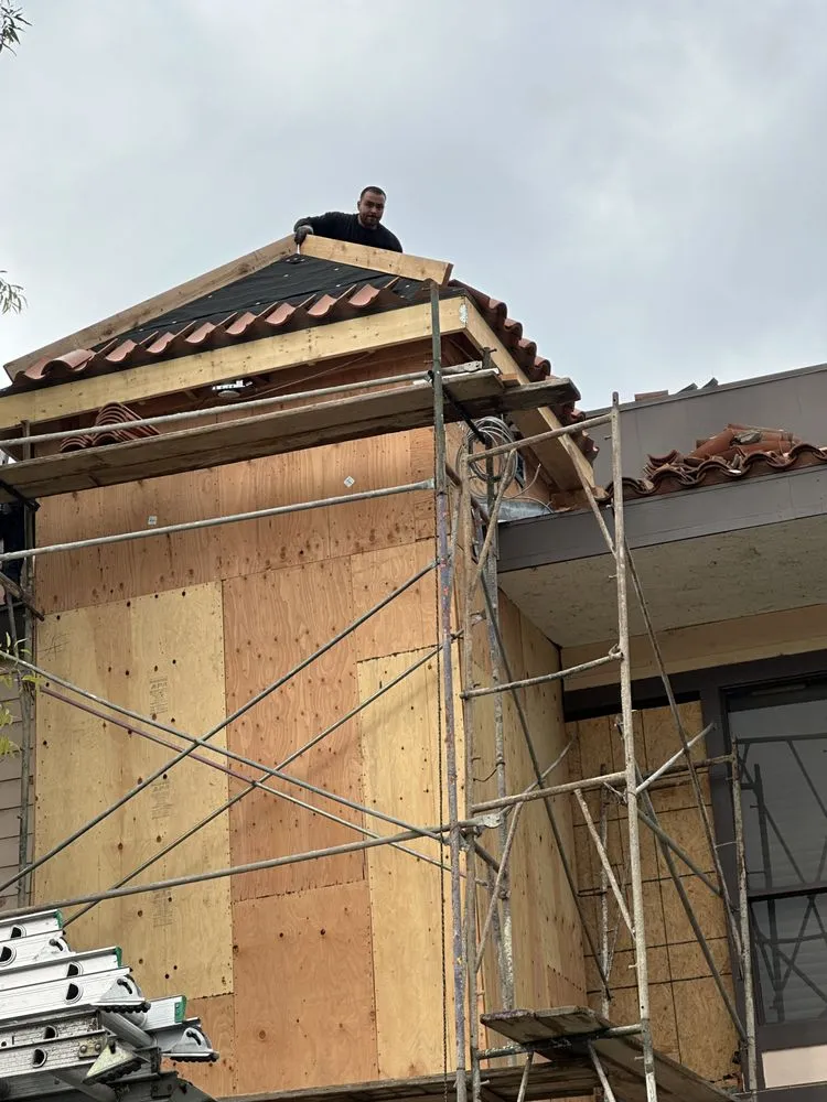 Slide of Frank Delgado Roofing