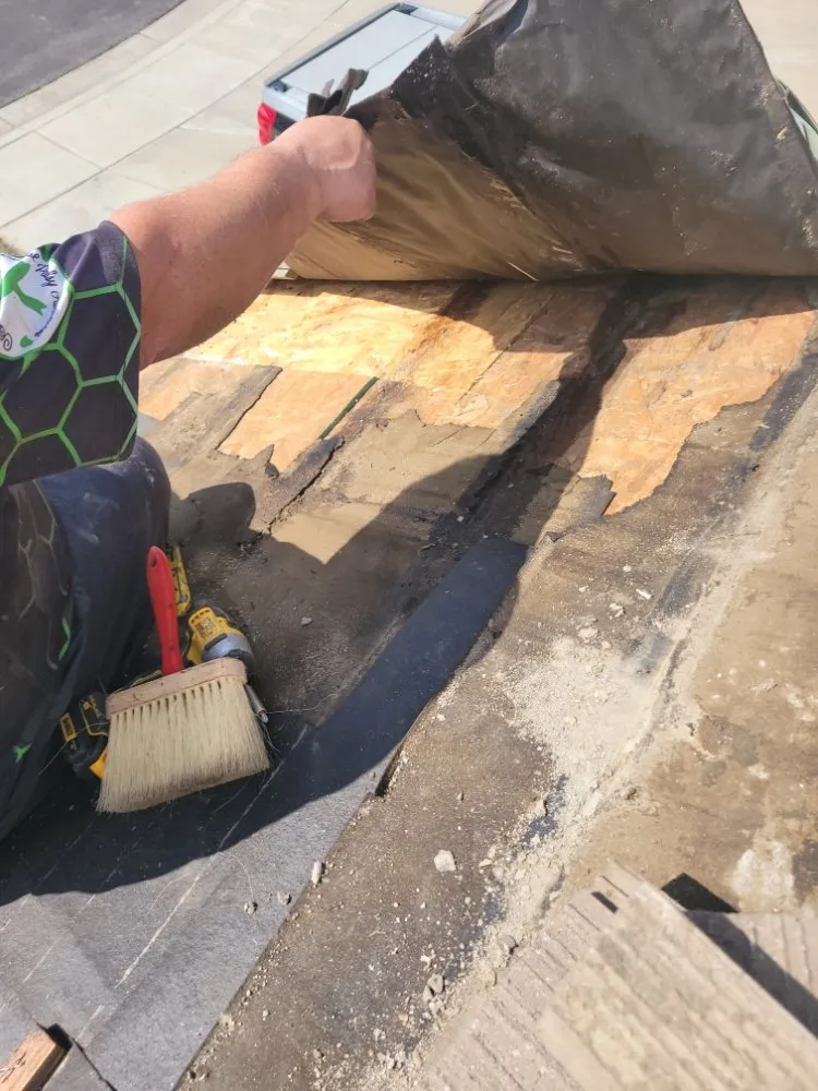 Slide of Franks Roof  Repairs