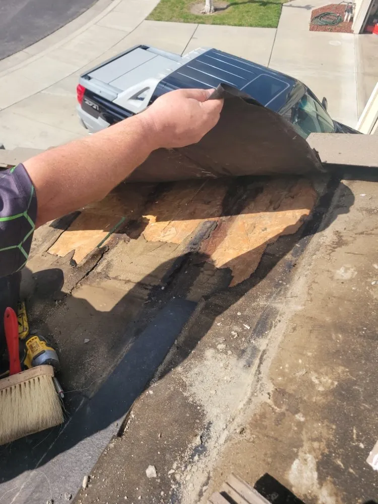 Slide of Franks Roof  Repairs