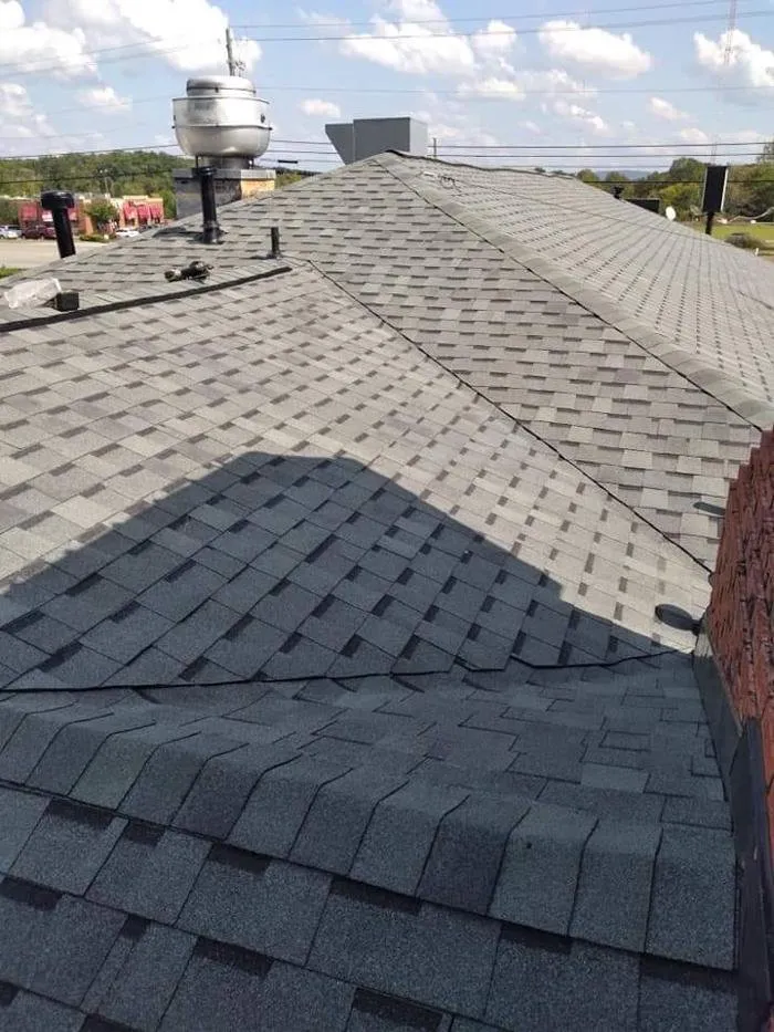 Slide of Frank's Roofing