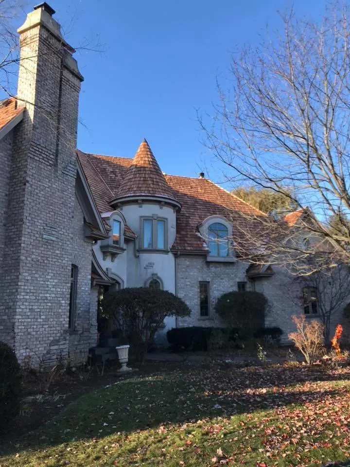 Slide of Franos Roofing