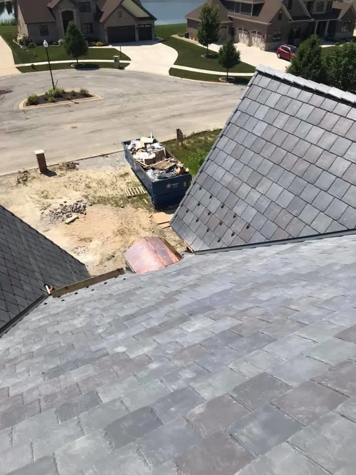 Slide of Franos Roofing