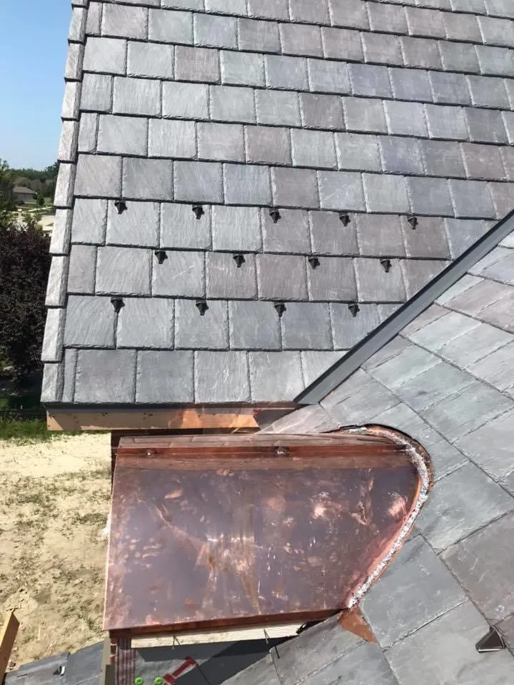 Slide of Franos Roofing