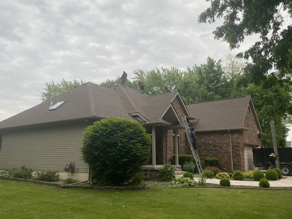 Slide of Franos Roofing