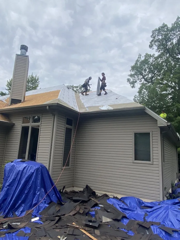 Slide of Franos Roofing