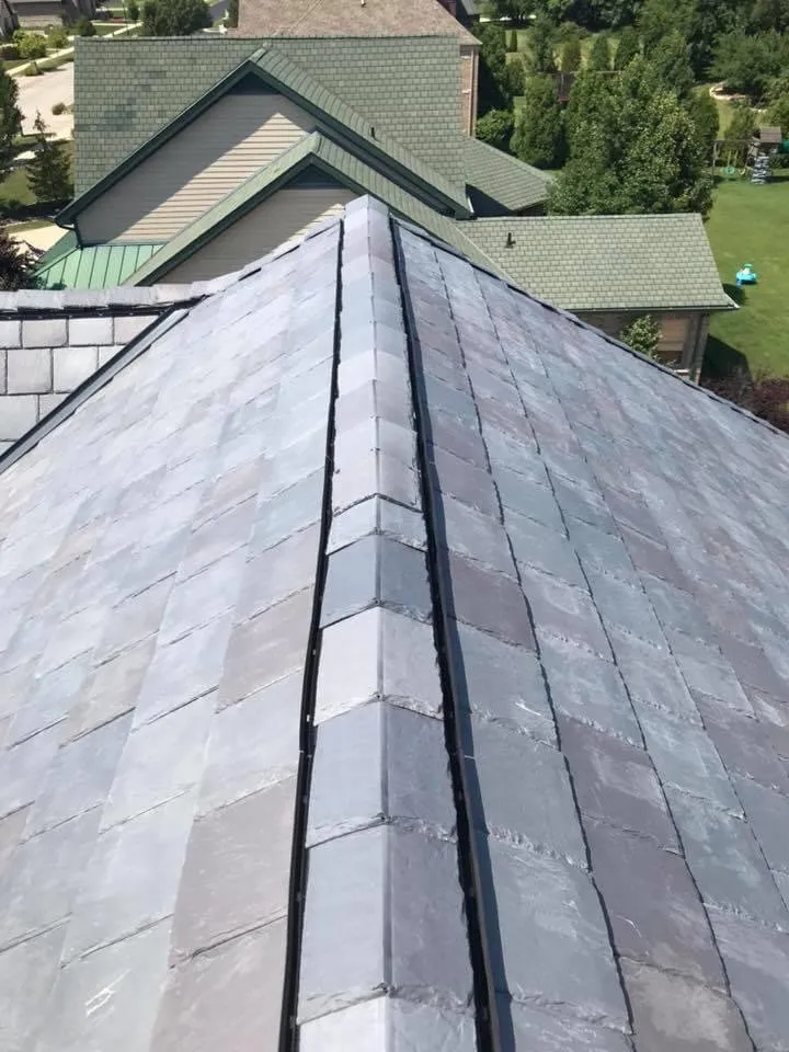 Slide of Franos Roofing