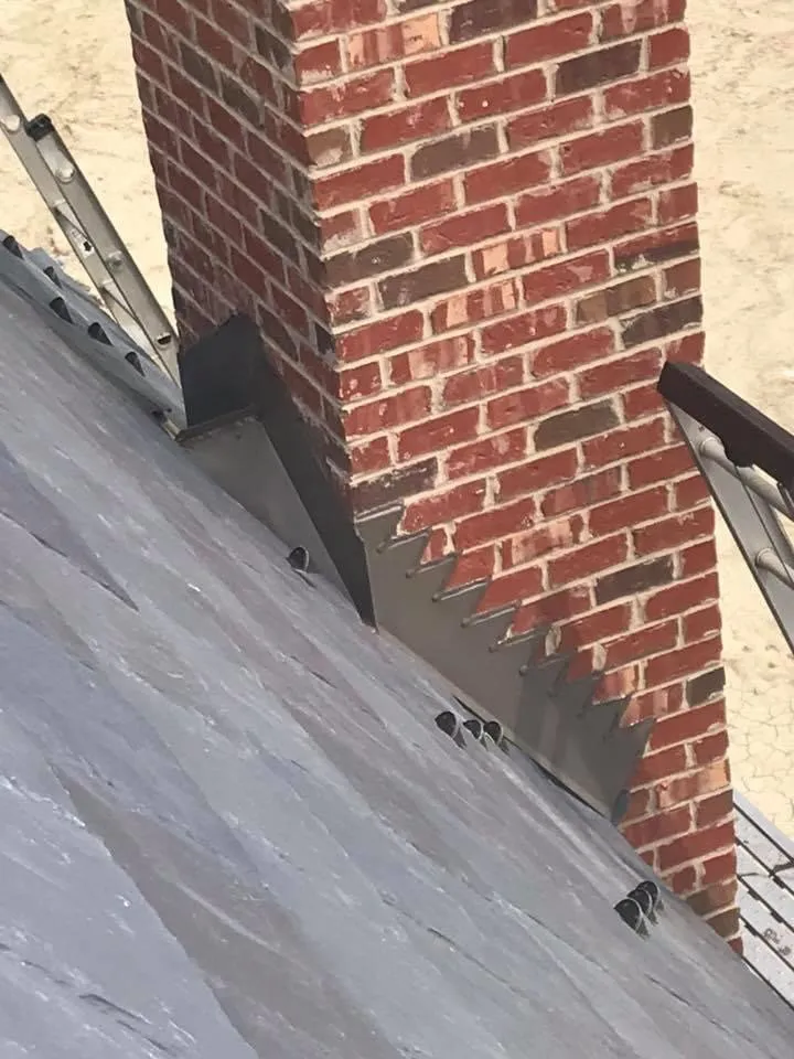 Slide of Franos Roofing