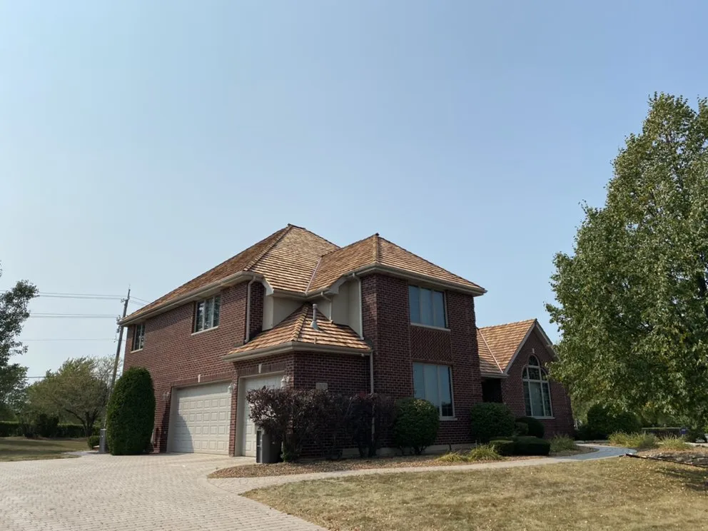 Slide of Franos Roofing