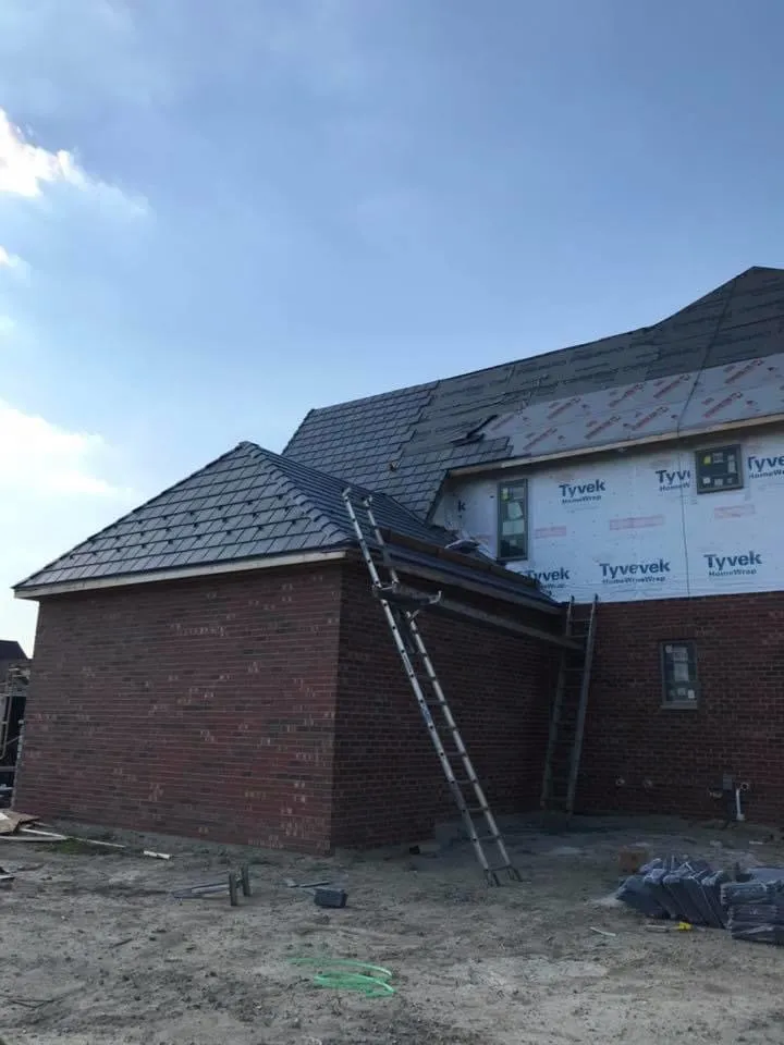 Slide of Franos Roofing