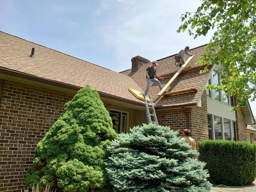 Slide of Fraziers Roofing and Guttering
