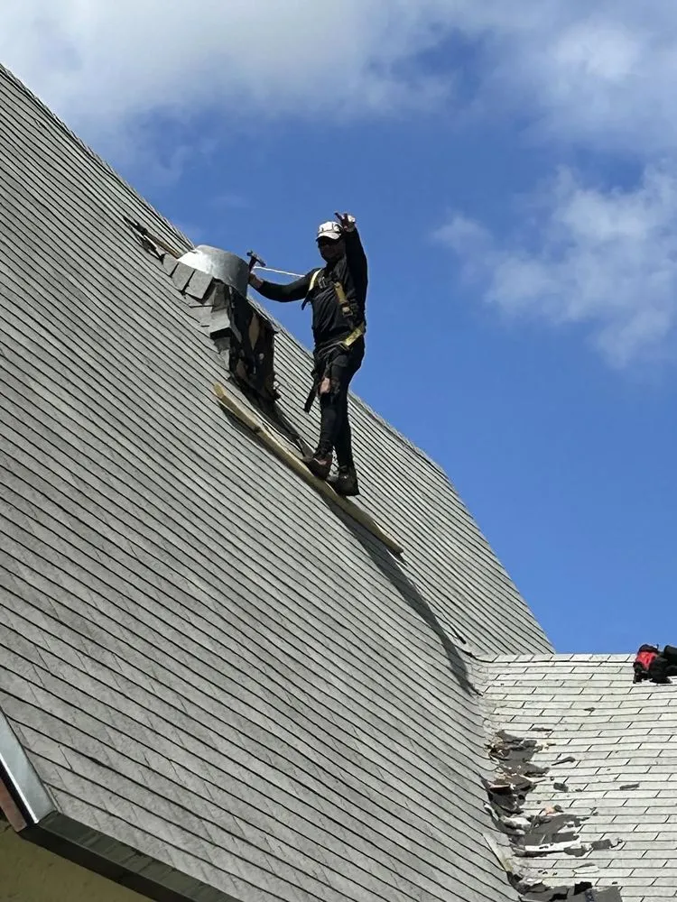 Slide of Fred Roofing Service