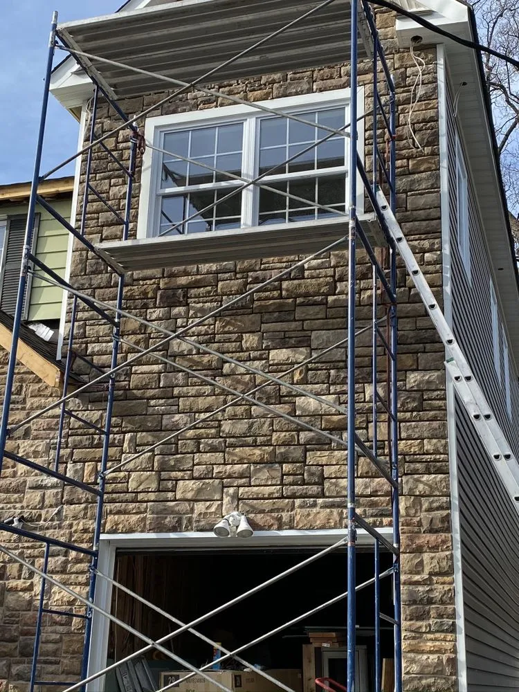 Slide of Freddy Chimney & Construction