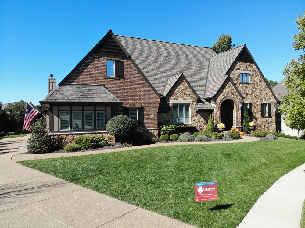 Slide of Freedom Restoration and Roofing