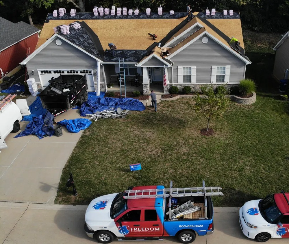 Slide of Freedom Restoration and Roofing