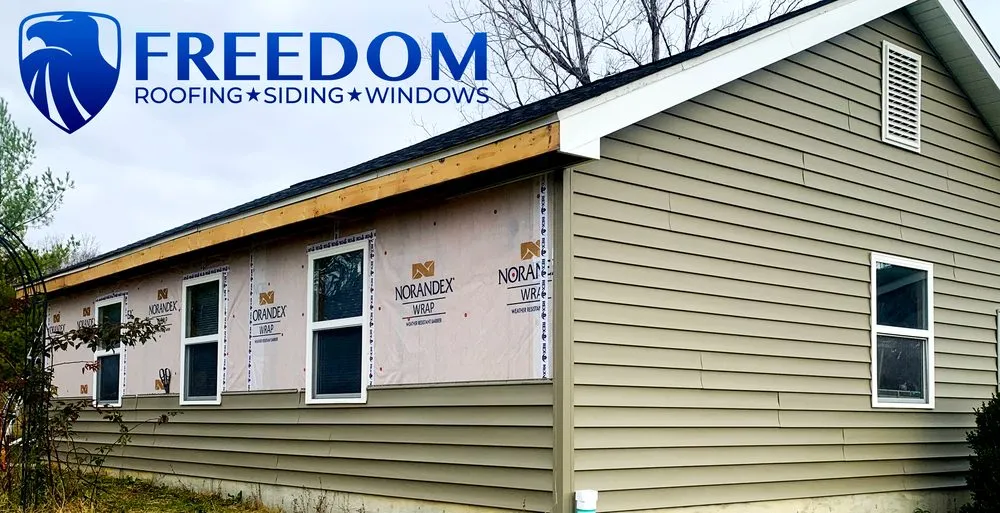Slide of Freedom Restoration and Roofing