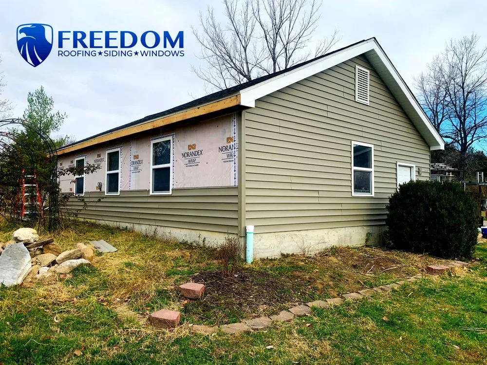 Slide of Freedom Restoration and Roofing