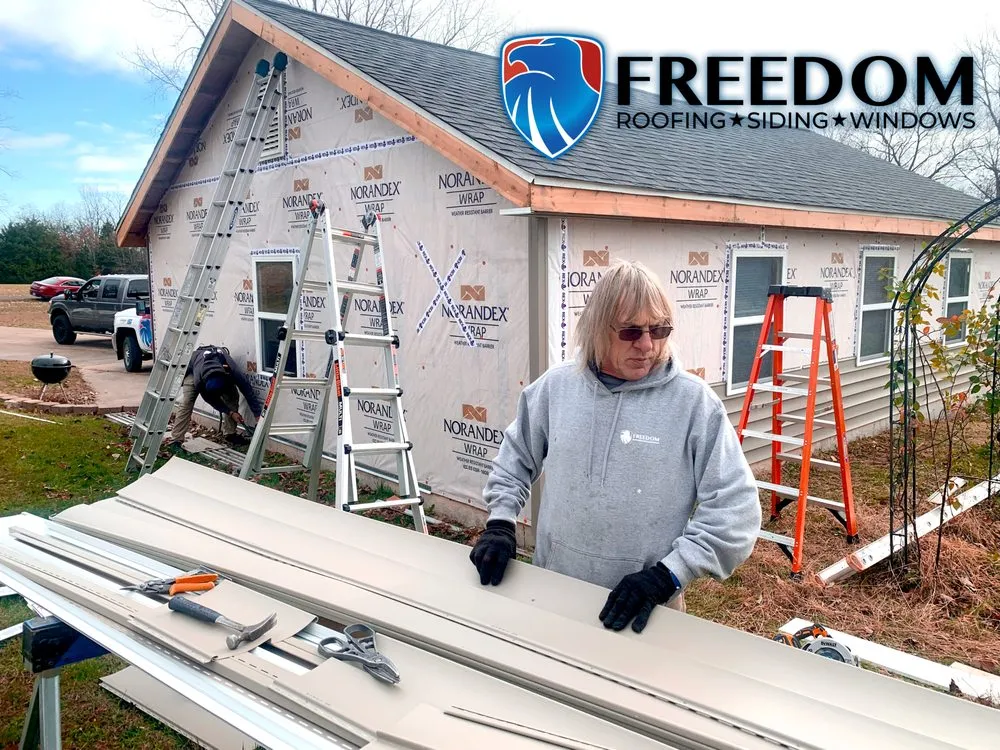 Slide of Freedom Restoration and Roofing