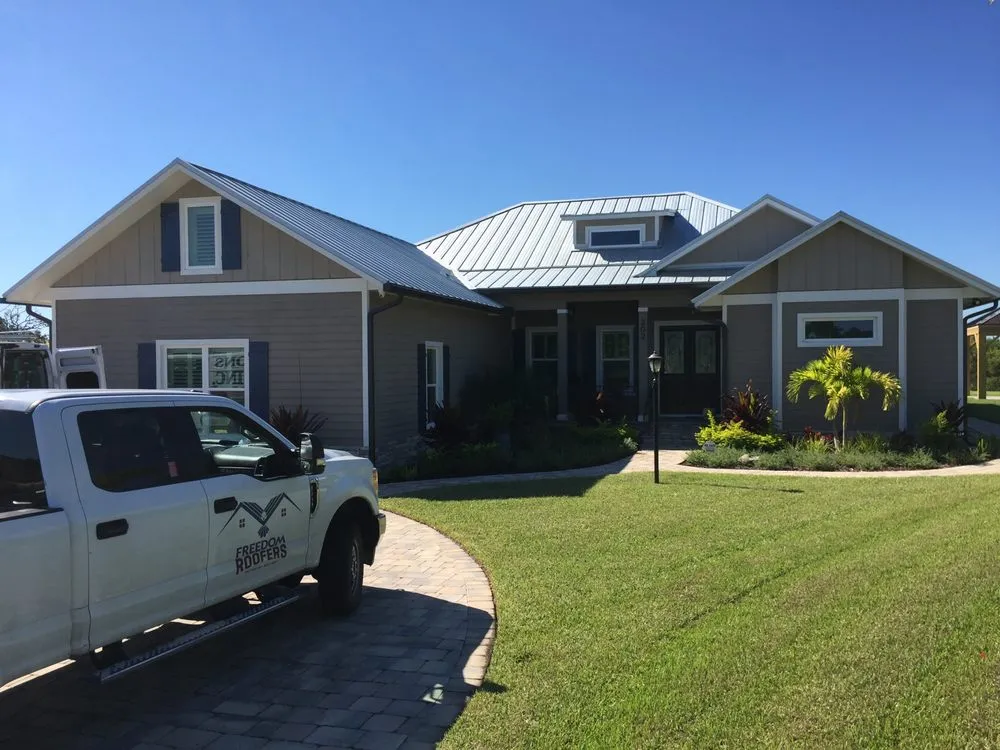 Slide of Freedom Roofers