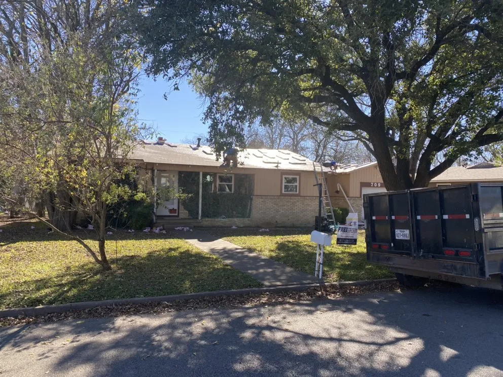 Slide of Freedom Roofing & Construction