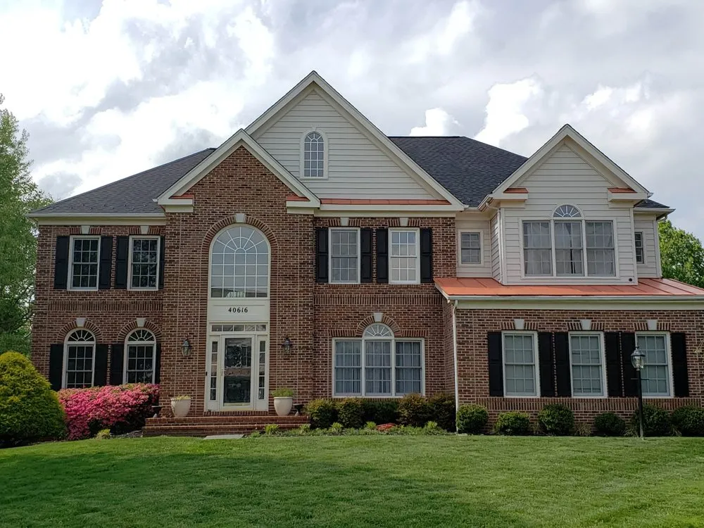 Slide of Freedom Roofing and Exteriors