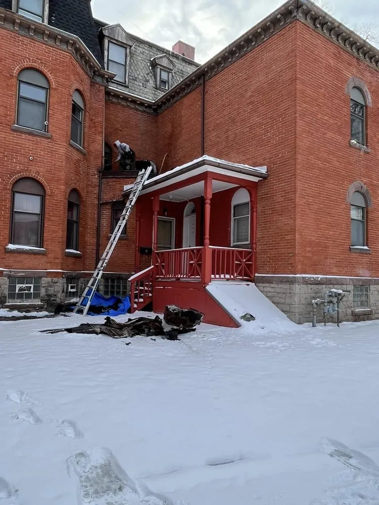 Slide of Freedom Roofing and Windows