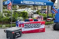 Slide of Freedom Roofing