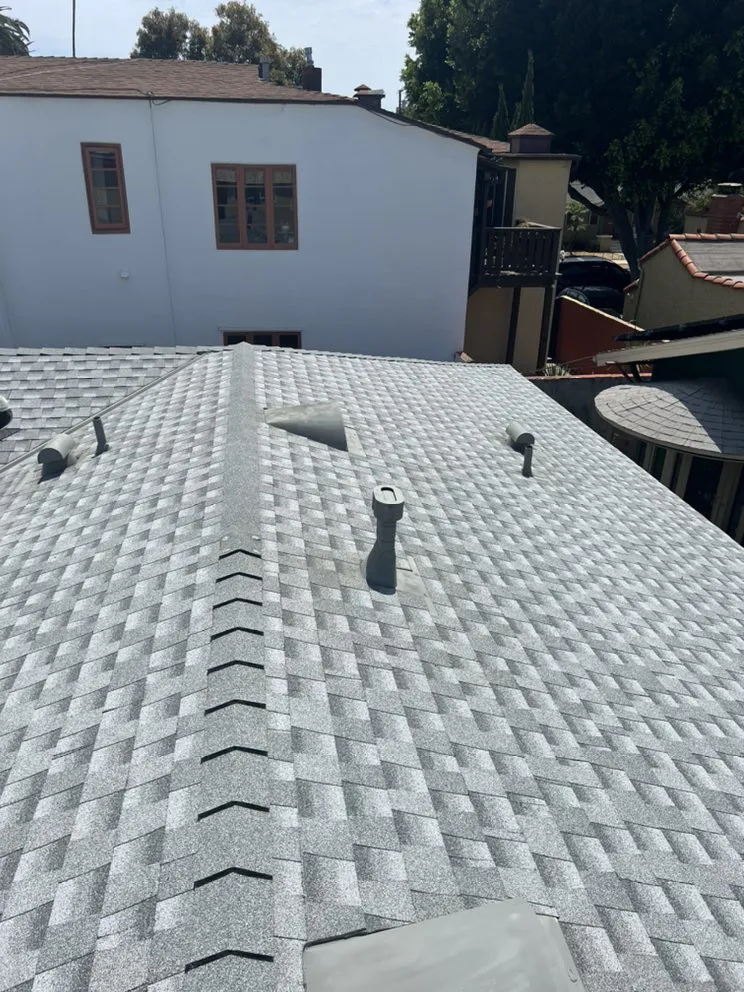 Slide of Freedom Roofing Company