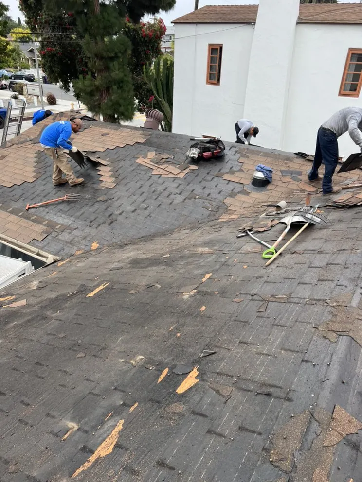 Slide of Freedom Roofing Company