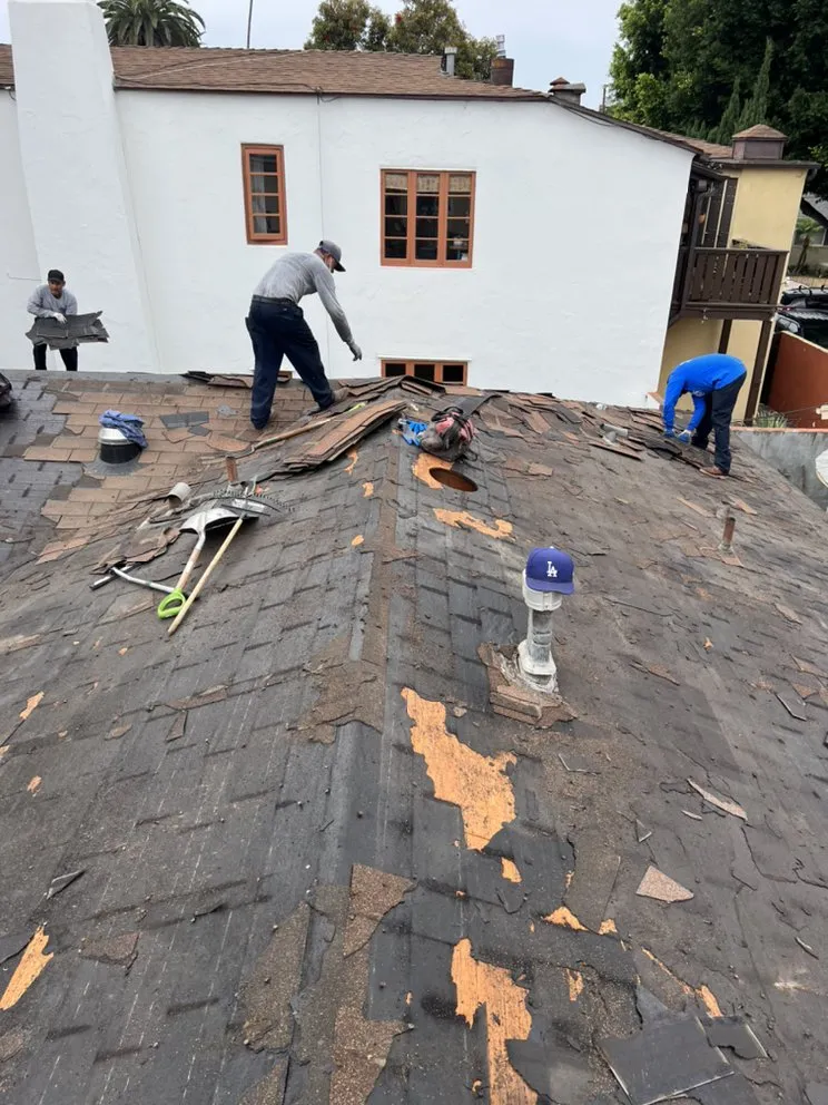 Slide of Freedom Roofing Company