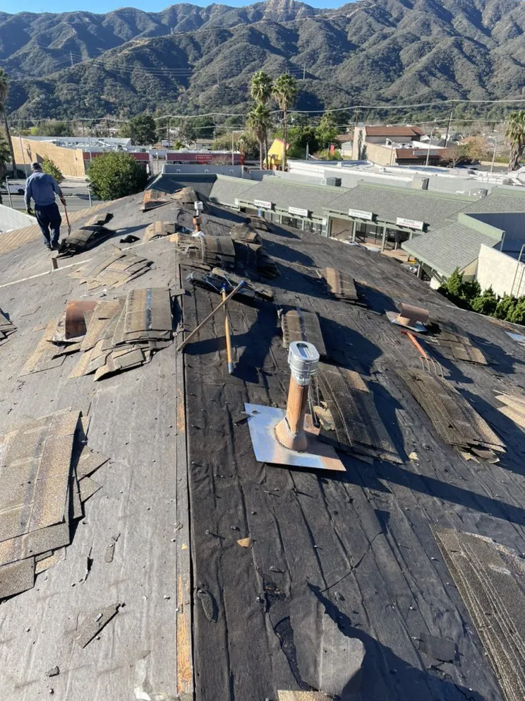 Slide of Freedom Roofing Company