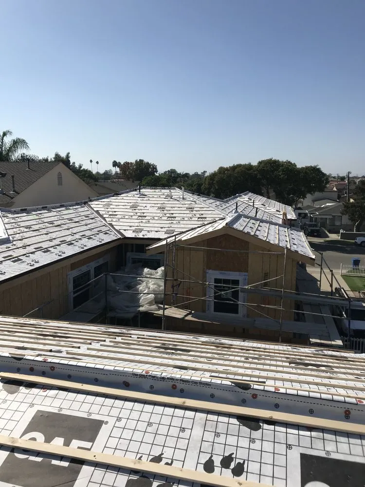 Slide of Freedom Roofing Company