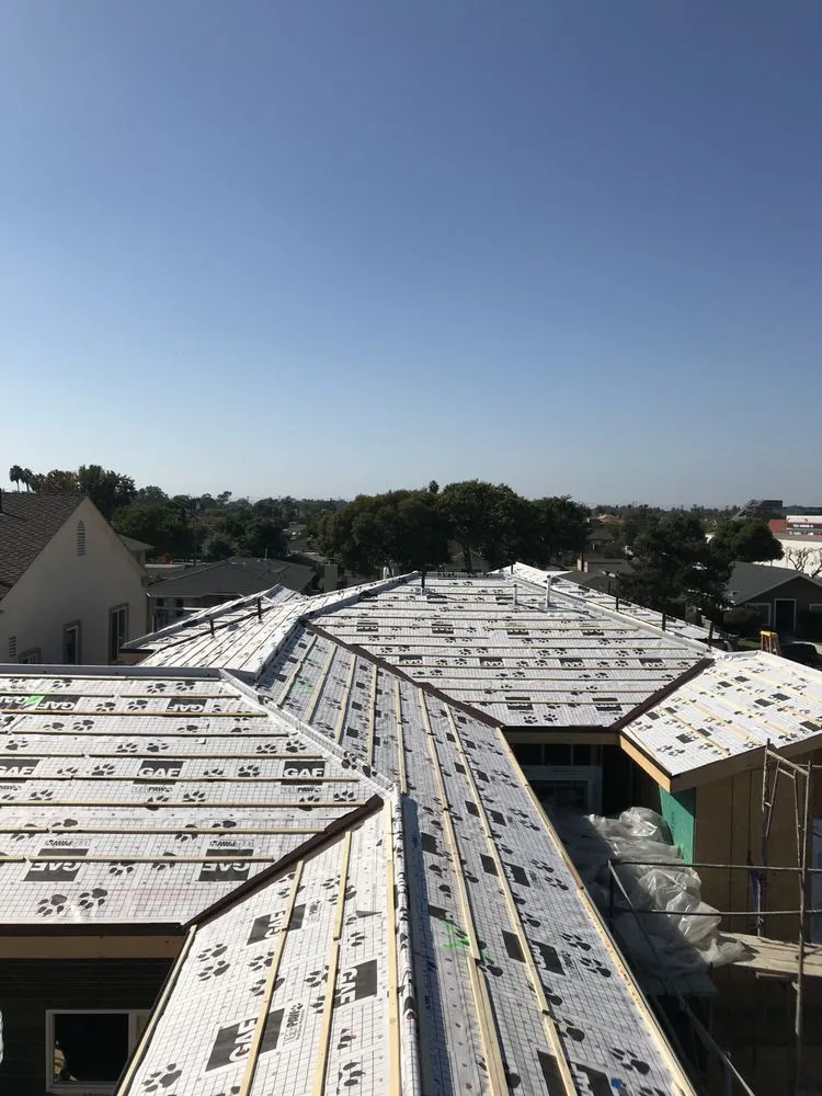 Slide of Freedom Roofing Company