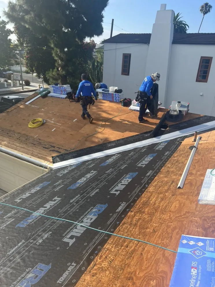 Slide of Freedom Roofing Company