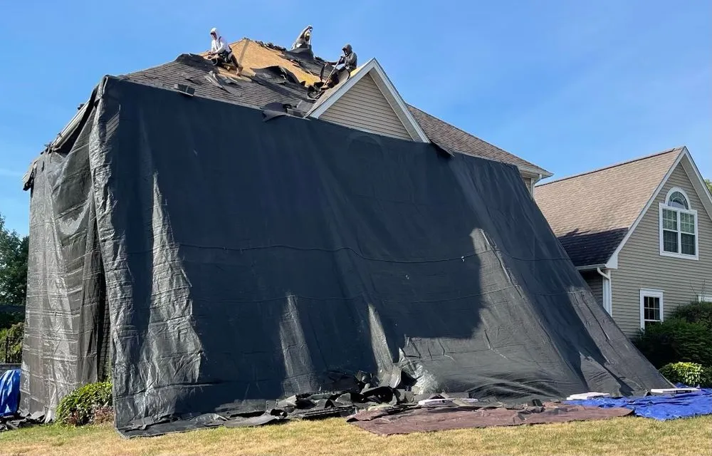 Slide of Freedom Roofing Maine