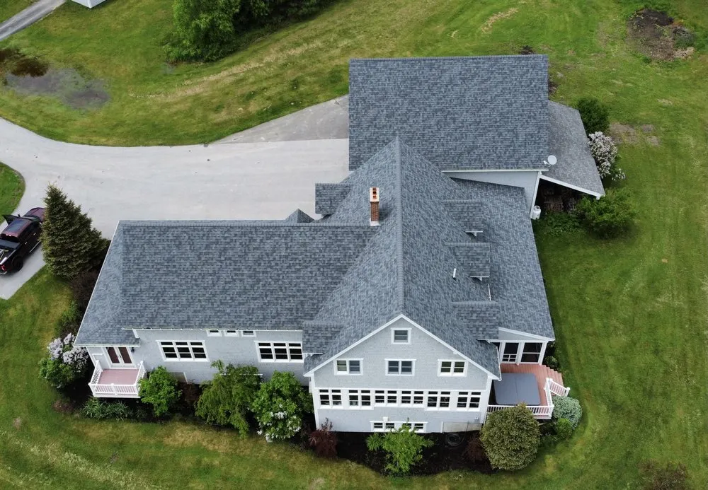 Slide of Freedom Roofing Maine