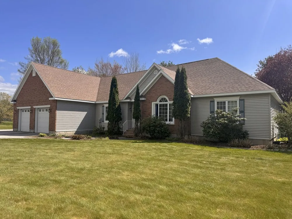 Slide of Freedom Roofing Maine