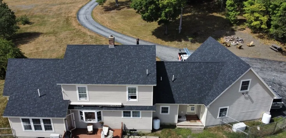 Slide of Freedom Roofing Maine