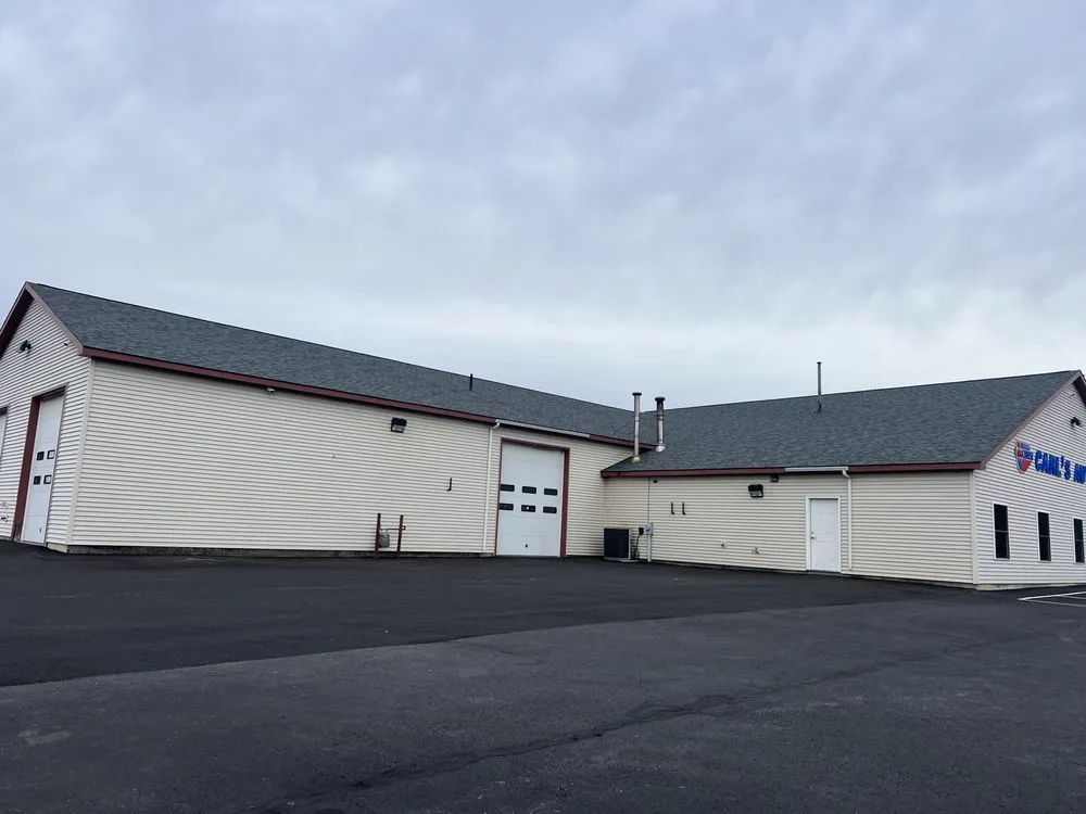 Slide of Freedom Roofing Maine