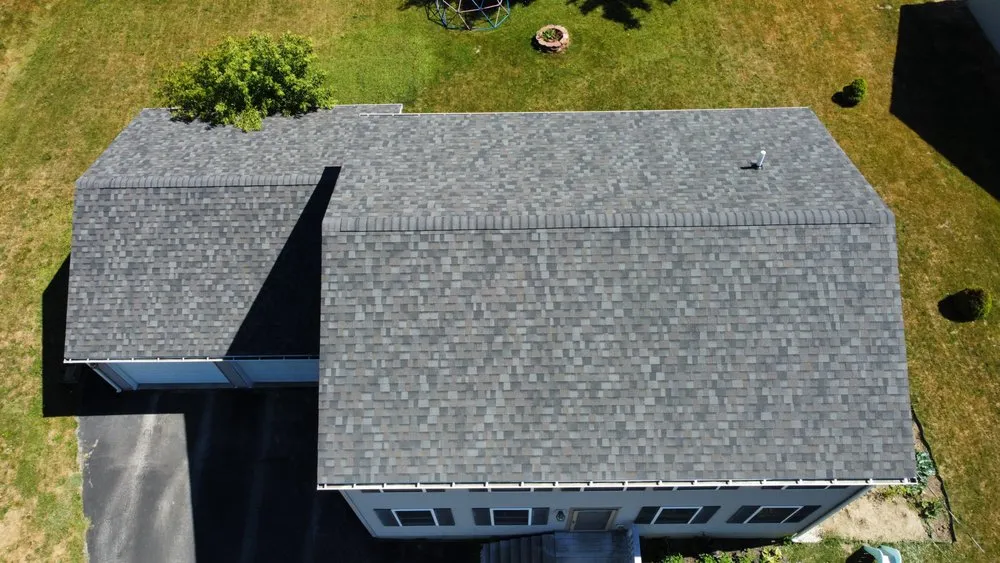 Slide of Freedom Roofing Maine