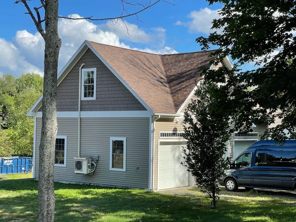 Slide of Freedom Roofing Maine