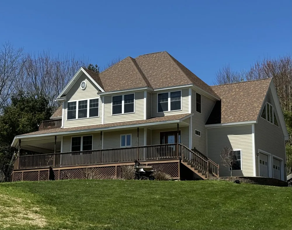 Slide of Freedom Roofing Maine