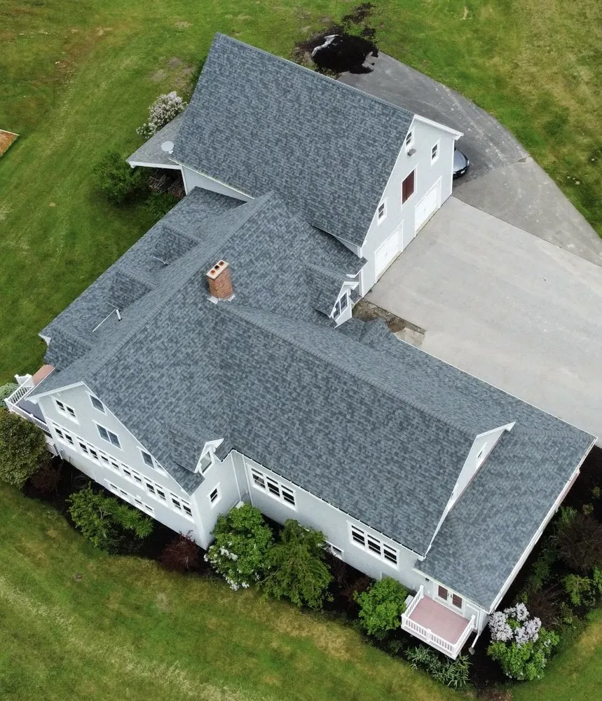 Slide of Freedom Roofing Maine