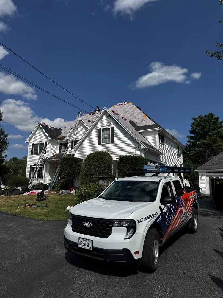 Slide of Freedom Roofing Maine