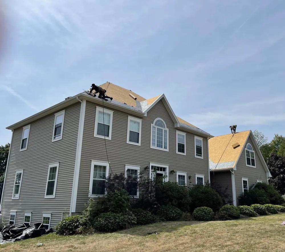 Slide of Freedom Roofing Maine