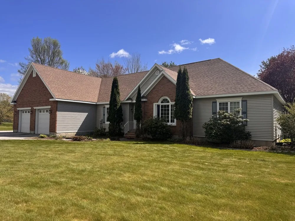 Slide of Freedom Roofing Maine