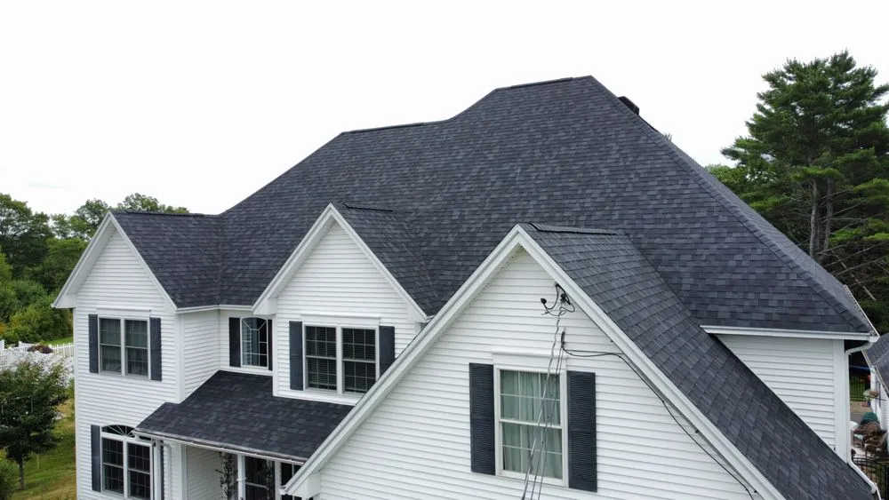 Slide of Freedom Roofing Maine