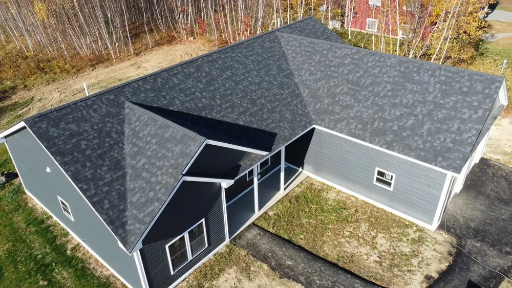 Slide of Freedom Roofing Maine